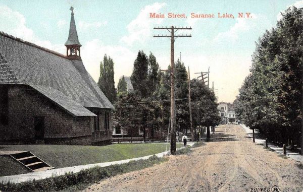 Saranac Lake New York Main Street Scene Church Antique Postcard K98094