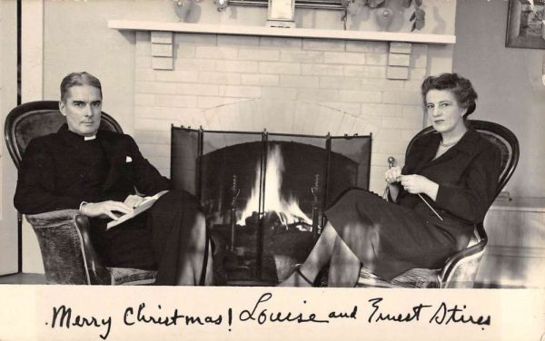 Merry Christmas Priest Couple Fireplace Real Photo Antique Postcard K100021