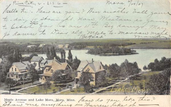 Mora Minnesota Maple Avenue Lake Waterfront Antique Postcard K103031