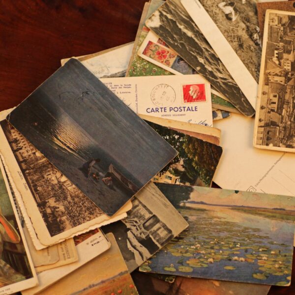 Piles of vintage postcards