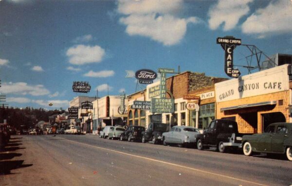 Flagstaff Arizona Main Street Ford Car Dealership Vintage Postcard AA79497