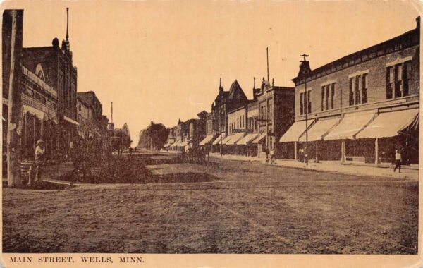 Wells Minnesota Main Street Vintage Postcard AA93474