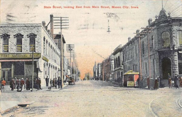 Mason City Iowa State Street Looking East First Nationa Bank Postcard AA94883