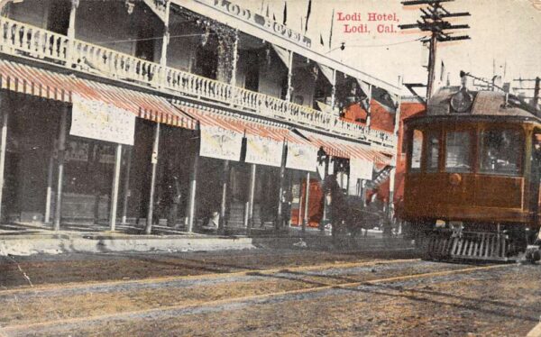 Lodi California Lodi Hotel Street Scene Trolley Postcard AA95836