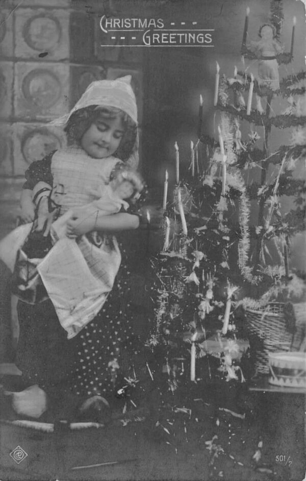 Christmas Greetings Girl with Baby Doll by Tree Real Photo Postcard AA96404