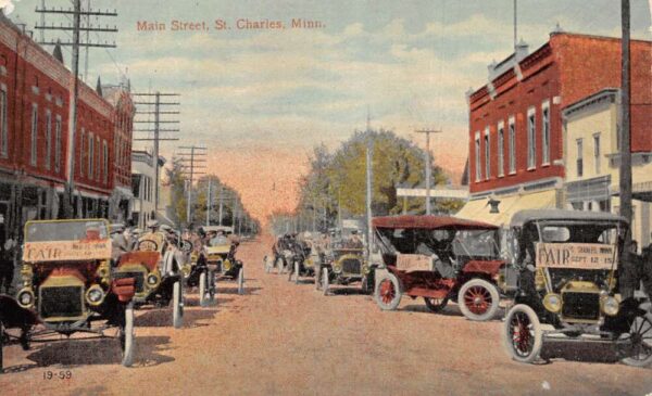 St Charles Minnesota Main Street Fair Signs on Cars Vintage Postcard AA93188