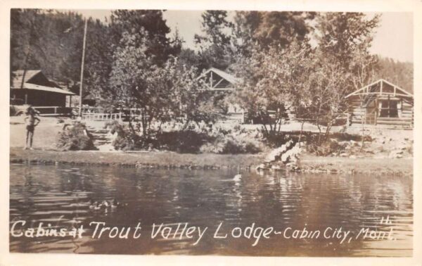 Cabin City Montana Trout Valley Lodge Cabins Real Photo Postcard AA93244