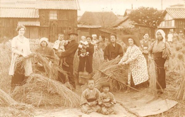 White Women Posing with Japanese Workers in Hay Field Real Photo PC AA94018