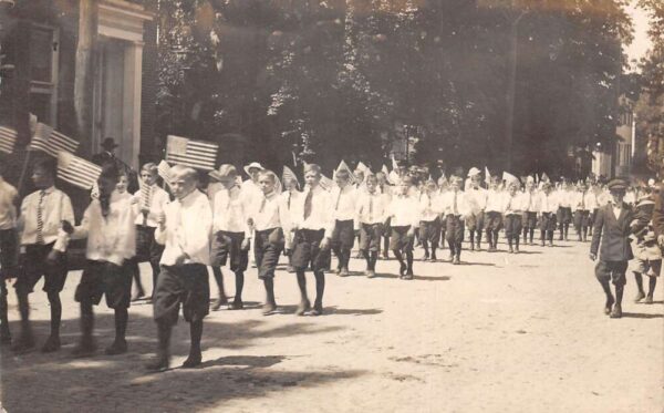 Patriotic Parade Boys Holding USA Flags Real Photo Vintage Postcard AA94088