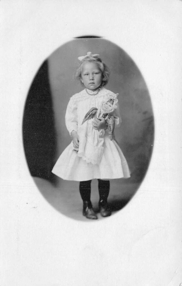 Girl Holding Doll Real Photo Vintage Postcard AA94446