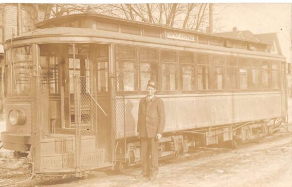 Burns Avenue Street Trolley Car and Motorman Real Photo Postcard AA95045