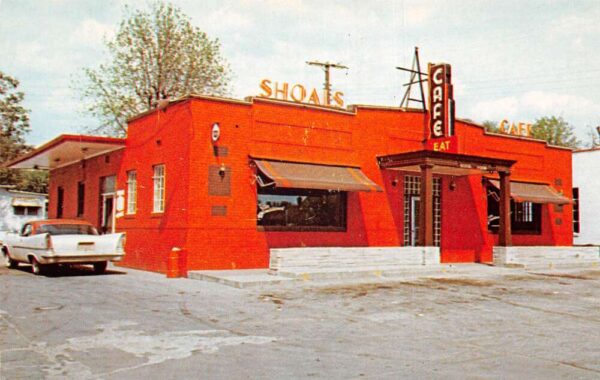 Shoals Indiana Shoals Cafe Orange Greyhound Bus Stop Vintage Postcard AA95397