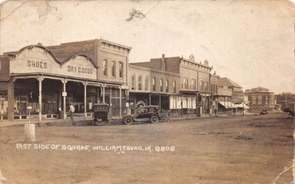 Williamsburg Iowa East Side of Square Business District Real Photo PC AA98541